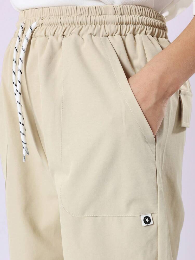 Wide Leg Cargo Pants With Drawstring And Side Pockets