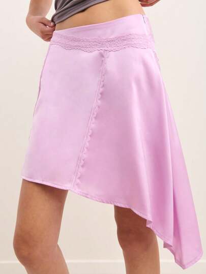 Nöista Pink Satin Mini Skirt With Lace Trim Detail And Asymmetric Hem. Made From Smooth, Lightweight Satin Fabric For A Silky Feel. Stylish, Feminine, Elegant, Party, Summer, Chic, Versatile, Comfortable.