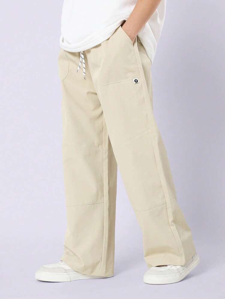 Wide Leg Cargo Pants With Drawstring And Side Pockets