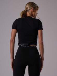 Musera Sport Áo thun trẻ em thể thao ôm sát, viền tương phản, không đường may, kiểu dáng năng động, thích hợp cho tập luyện thể dục thể thao, mùa hè, câu lạc bộ Padel, phòng tập gym và thể dục. - màu đen - Xem 4