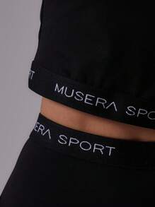 Musera Sport Áo thun trẻ em thể thao ôm sát, viền tương phản, không đường may, kiểu dáng năng động, thích hợp cho tập luyện thể dục thể thao, mùa hè, câu lạc bộ Padel, phòng tập gym và thể dục. - màu đen - Xem 6