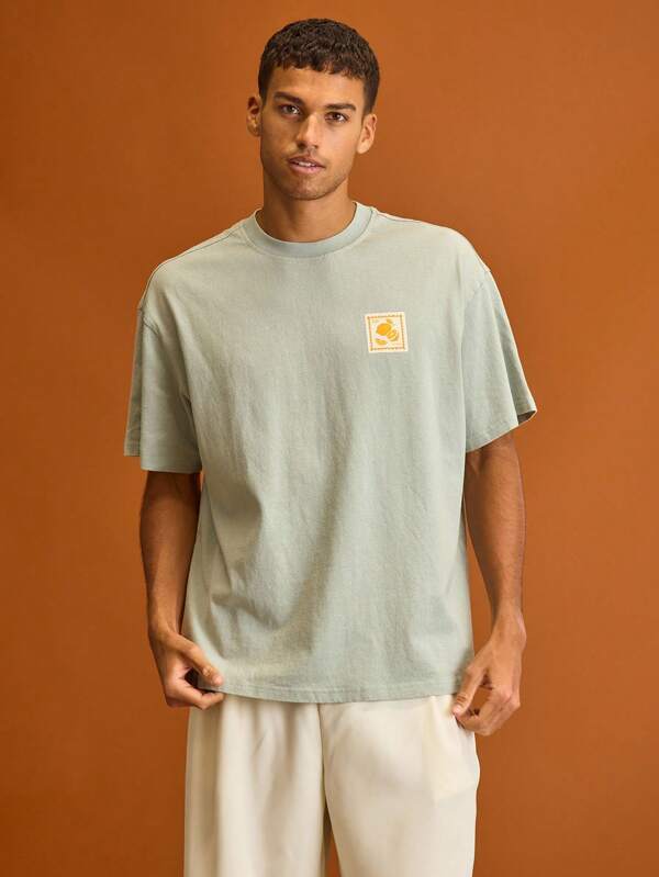 Musero Men Short Sleeve Oversized Graphic Chest Patch Detail Crewneck T-Shirt Spring Summer Wradrobe