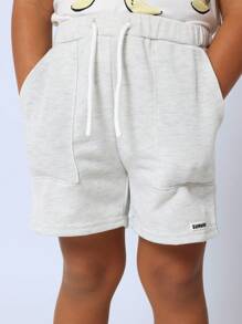 SUMWON Ensemble coordonné d'été pour enfants. T-shirt avec imprimé banane, shorts en jersey avec cordon de serrage. Tenue de plage décontractée pour les vacances. Confort toute la journée, coupe ample