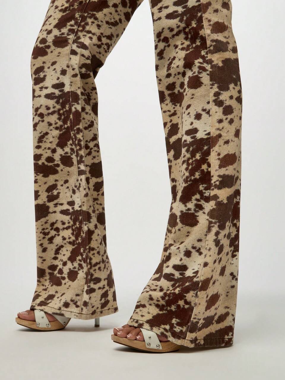 SUMWON WOMEN Cow Print Flare Jeans With Lace Up Front Detail