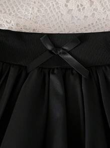 SHEIN Elladie kids Falda globo de línea A de unicolor para niñas pequeñas. El tono de unicolor exhibe un estilo elegante y el diseño de burbuja le agrega un toque lindo. La silueta de línea A favorece la figura, adecuada para bebés de todos los tipos de Body. Ya sea para juegos al aire libre, descanso casual en casa, actividades cotidianas o ocasiones especiales, esta falda permitirá que su pequeña princesa muestre su encanto único y disfrute de momentos felices. - Negro - Ver 4