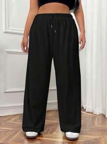 Calça de moletom plus size com amarração frontal e cor sólida simples e casual