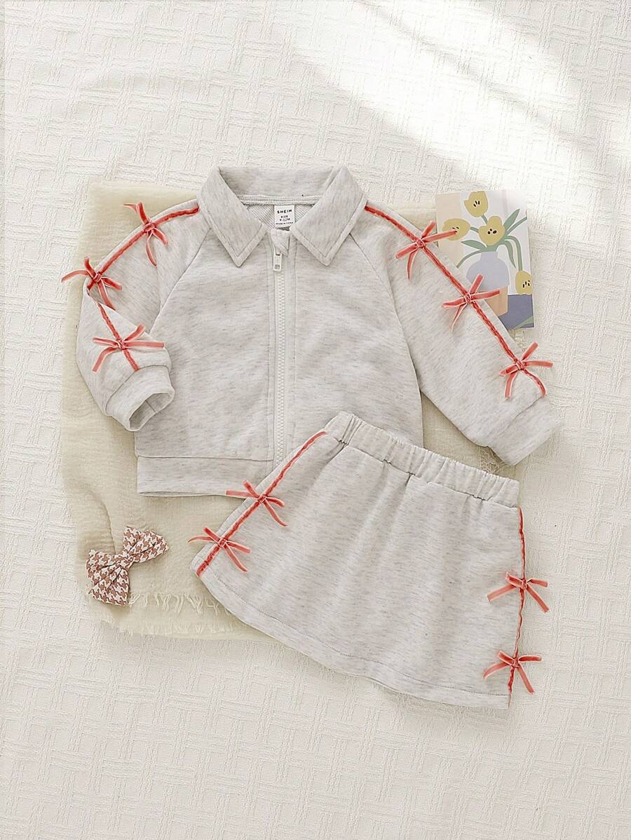 SHEIN Ensemble de 2 pièces pour bébé fille, veste à fermeture éclair avec décoration nœud 3D et jupe, tenue casual polyvalente adaptée pour le printemps, l'automne et l'hiver, pour un usage quotidien - Gris pâle - Voir 1