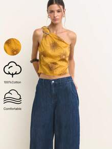 Nöista 单肩露脐上衣，饰有醒目的太阳印花和银色圆环细节。轻盈的面料使其成为圣约翰岛派对、假日或7月4日庆祝活动的完美之选，也是夏季外出活动的理想选择。 - 黃色 - 查看 1