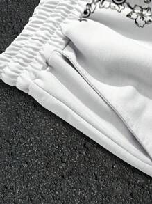 Manfinity EMRG 返校服 男童 男士 男士抽绳腰带天使印花口袋休闲短裤 男士图案短裤 男士动漫短裤 街头潮流 男士短裤 丘比特短裤 天使短裤 - 彩色 - 查看 4