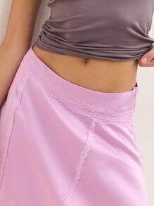 Nöista Pink Satin Mini Skirt With Lace Trim Detail And Asymmetric Hem. Made From Smooth, Lightweight Satin Fabric For A Silky Feel. Stylish, Feminine, Elegant, Party, Summer, Chic, Versatile, Comfortable. - Pink - View 7