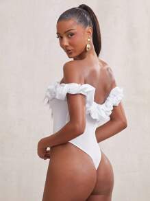 NYA SZN Bodysuit Floral Kontrast Bodysuit mit Kreuzriemen Detail, Tee-Party, Ausgehen, Büro, inspiriert von Prominenten