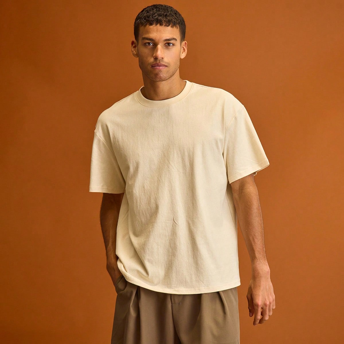 Camiseta de cuello redondo de manga corta con gráfico oversize para hombres, primavera y verano