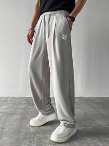 Manfinity Hypemode 男士休闲街头时尚字母和星星印花抽绳腰部宽松直筒运动裤 - 灰色 - 查看 1