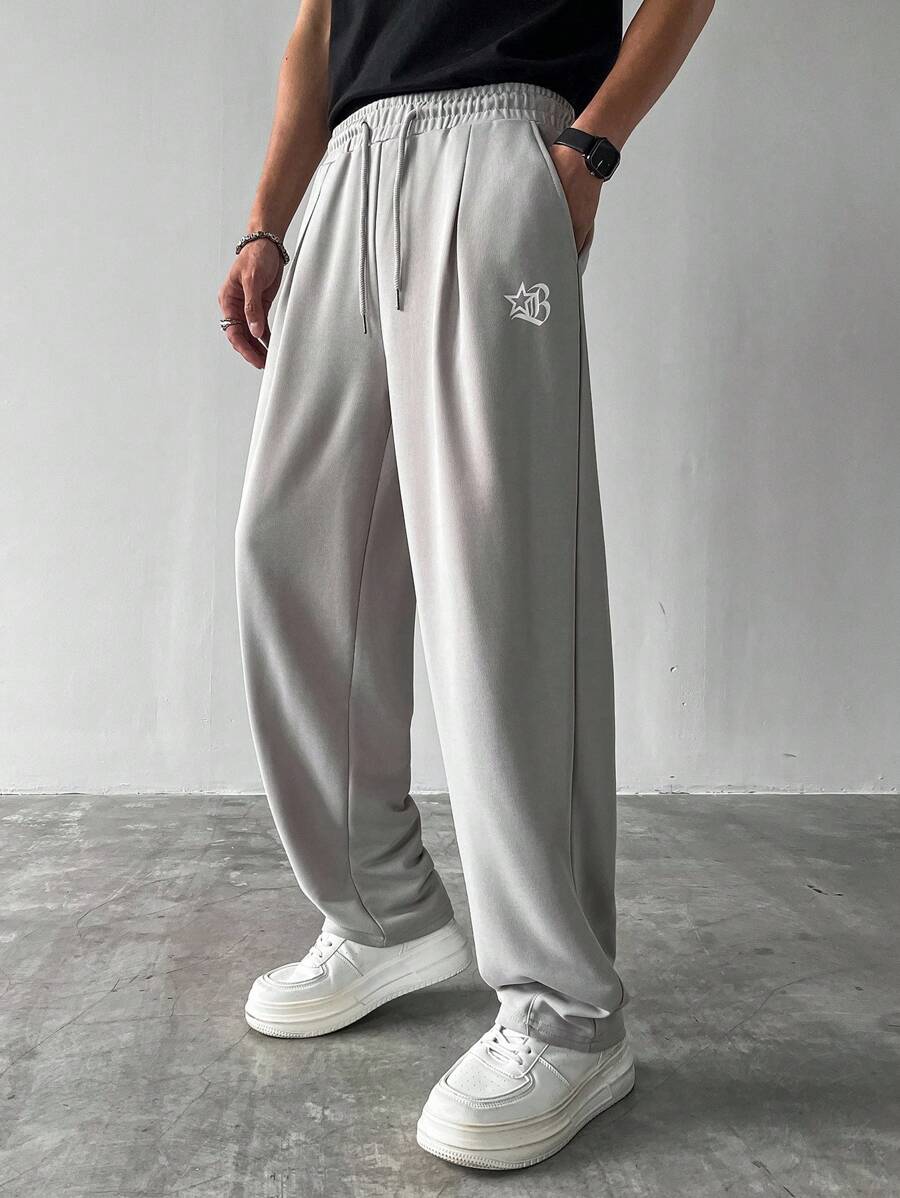 Manfinity Hypemode 男士休闲街头时尚字母和星星印花抽绳腰部宽松直筒运动裤 - 灰色 - 查看 1