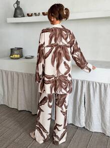 EURMUSE Set a due pezzi con stampa perfetta, eleganza senza sforzo con atmosfere da kimono, stampe audaci, silhouette rilassata. L'arte dello stile in un set abbinato, look deciso con un tocco fluido. Set ispirato al kimono per giorni chic. Stampe accattivanti, vestibilità agevole, dallo svago alla strada - stile in ogni passo. Avvolto nello stile, alimentato dalle stampe.