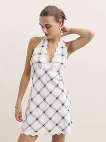 Nöista 这款挂脖迷你连衣裙采用柔软的纹理面料和醒目的网格图案，格外引人注目。深领口和俏皮的设计，完美演绎时尚现代的风格。 - 杏色 - 查看 7