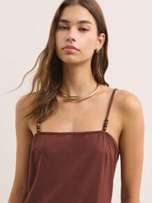Nöista Earthy Brown Straight-Cut Summer Slip Dress With Thin Straps And Tassel Hem. Lightweight Breathable Fabric Fits Summer Dresses For Women, Summer Outfits For Women, Cute Summer Tops, Women's Summer Clothes, Plus Size Summer Clothes, And Perfect For Vacation Or European Summer Style. Ideal For Casual 4th Of July Outfit Women.