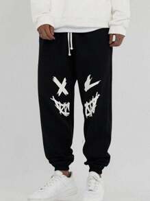 SHEIN Pantaloni de trening negri imprimați cu model de desene animate pentru adolescenți, colegii casual, comozi și la modă, versatil, țesătură moale, potriviti pentru uzura zilnică, școală, călătorii, sporturi în aer liber, primăvară/vară