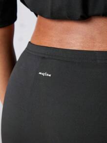 SHEIN Sports Women's Solid Color Split Casual Sports Skort, Back To School Outfits, Graduation, Back To School, Low Rise Micro Mini Shorts, Active, Workout, Gym, Padel, Tennis, Pickleball, Y2k,Sexy Black Mini Skirt Skort - Black - View 2