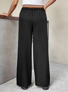 SHEIN Calça casual solta de perna larga com bolso ajustável na cintura, cor sólida, para gestantes - Preto - Visão 3