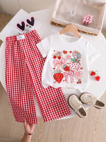 SHEIN Playful Pals Young Girls 2pcs Set: Strawberry Bow Print Short Sleeve T-Shirt & Gingham Wide Leg Loose Pants, Summer