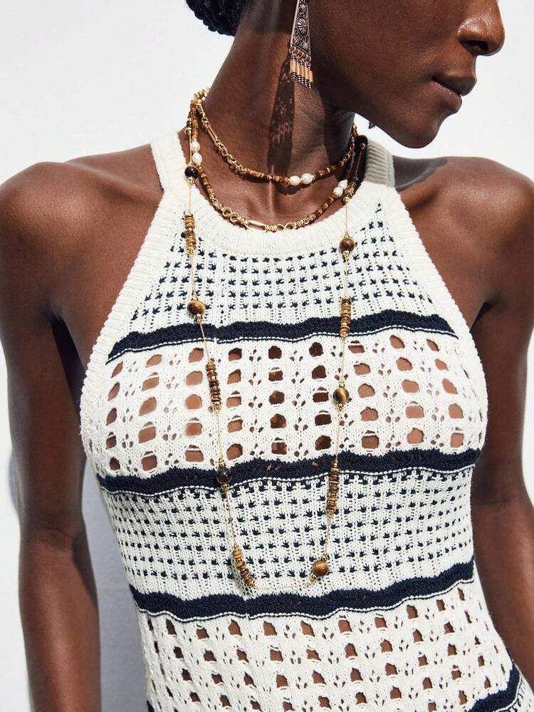 SHEIN Maija Stylish Women's Sleeveless Black And White Striped Knit Midi Dress, Designed With A Halter Neck, Semi-Sheer Details, And A Flattering Pencil Hem. Beach Clothing, Bohemian Style Vacation Wear, Summer Ins Celebrity Same Style Vacation Style, Exotic Atmosphere, Country Concert, Western Style Clothing, High-Grade Fabric, Comfortable And Breathable Country Concert, Western Style Clothing, High-Grade Fabric, Comfortable And Breathable