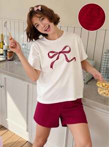 Set da due pezzi per ragazze pre-adolescenti, composto da top a maniche corte con stampa a fiocco in jacquard avorio e pantaloncini a righe in maglia, adatto per il ritorno a scuola - Multicolore - Visualizzare 10