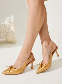 CUCCOO CHICEST Chaussures à talons hauts pour femmes avec nœud  enrobé noir, bout pointu, design ajouré et talon bottillon. Mode blogueuse, convient pour le travail, les tenues de cérémonie, les soirées et les rendez-vous