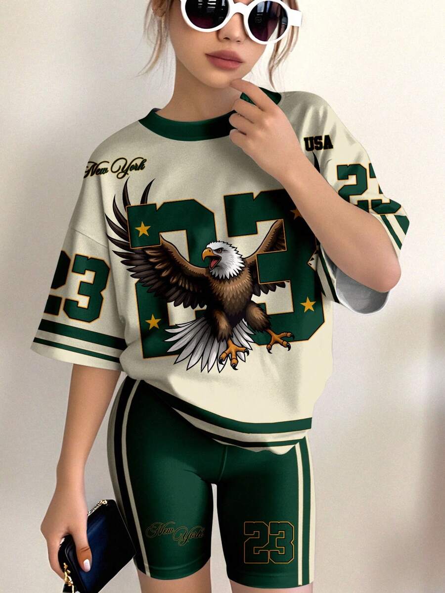 SHEIN Conjunto informal de dos piezas de niña preadolescente con camiseta de manga corta holgada estampada con el número de equipo 23 del águila, texto de Nueva York y patrón de estrella de cinco puntas, acompañada de mallas, adecuado para el verano - Multicolor - Ver 1