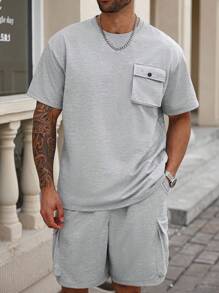 Manfinity Homme Große Größen Herren Lässig Set aus T-Shirt mit Tasche und Shorts mit Tasche