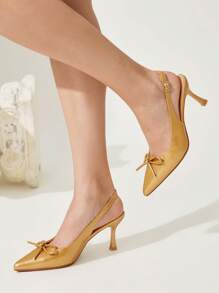 CUCCOO CHICEST Chaussures à talons hauts pour femmes avec nœud  enrobé noir, bout pointu, design ajouré et talon bottillon. Mode blogueuse, convient pour le travail, les tenues de cérémonie, les soirées et les rendez-vous