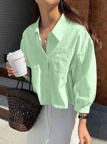 Jouncy Camisa suelta de manga corta de un solo pecho con bolsillo de unicolor para mujer