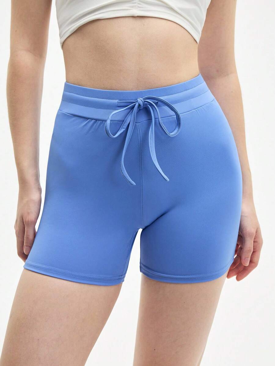 SHEIN Sports Short de sport décontracté pour femmes, unicolore, simple, taille haute avec cordon de serrage - Bleu azur - Voir 1