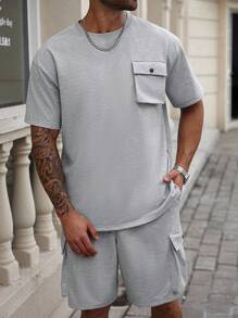 Manfinity Homme Große Größen Herren Lässig Set aus T-Shirt mit Tasche und Shorts mit Tasche