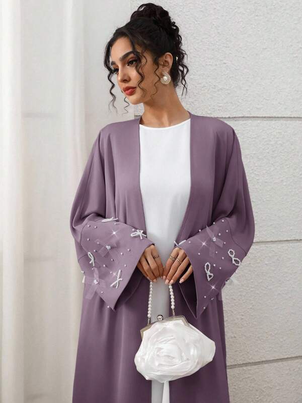 Yasmyna Cárdigan elegante de mujer con lazo y perlas falsas