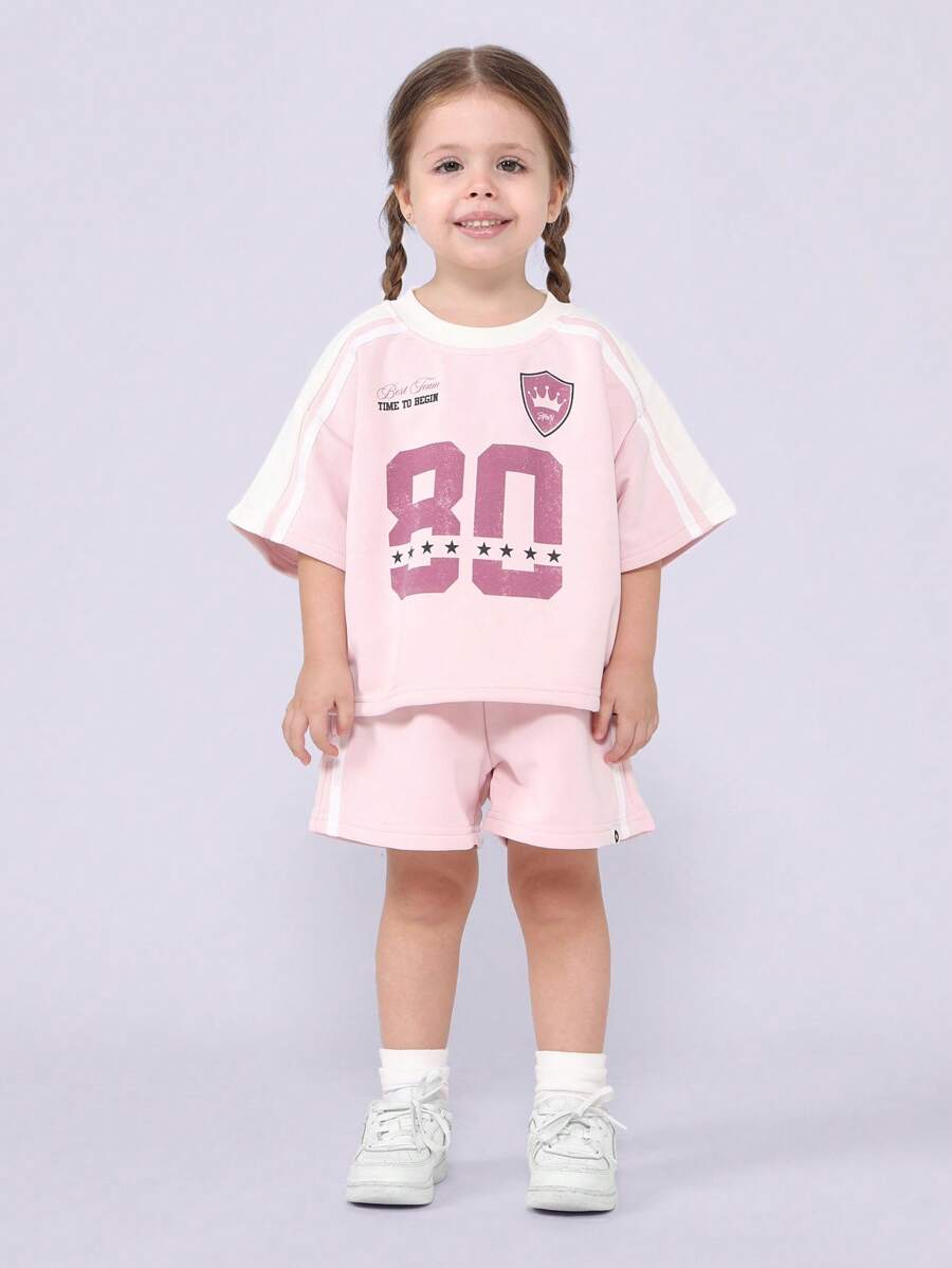 SUMWON طقم تي شيرت أكمام قصيرة مشترك مع شارة والأرقام الجامعية، قطعة صيفية ناعمة كاجوال مريحة تي شيرت وشورت، طقم أساسي للموضة للفتيات - وردي - مشاهدة 1