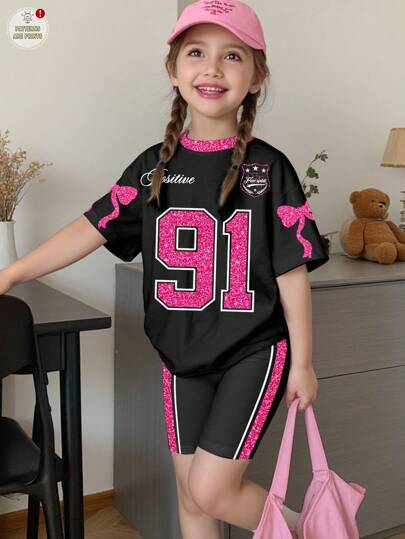 SHEIN Toddler Girls 91 Graphic Tee Shirt & Shorts 2 Pieces Set, Casual Sporty Fashion Sweet Style, Bow Decor, School/Travel Outfit For Summer Girls Summer Outfits Girls Sporty Sets 2 Piece Set Girl Girls Short Sleeve Sets Kids Summer Clothes