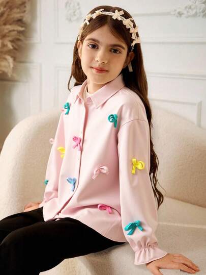 青少年女孩蝴蝶结装饰单排扣长袖宽松衬衫