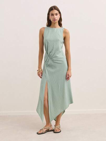 Nöista Sleeveless Midi Dress With A Round Neckline And An Asymmetric Hem. Its Elegant, Simple Design Flatters The Silhouette, Making It Ideal For Special Occasions Or Daytime Events In Spring, Summer, Or Fall. The Draped Detail And Flowy Cut Give It A Modern And Sophisticated Touch. Easily Styled With Boots, Sandals, Or Heels For Various Looks.