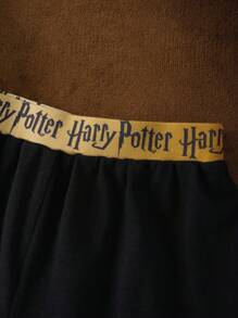 HARRY POTTER X SHEIN Tween Boy Four Houses 金色图案黑色休闲运动百搭短袖 T 恤和宽松短裤套装 - 黑色 - 查看 7