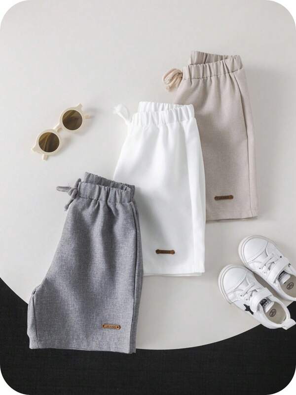 SHEIN 3pcs/Set Young Boy Casual College Style Solid Color Shorts With Elastic Waist And Decorative Rope