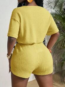 Slaydiva Nuevo estilo de primavera y verano casual básico de vacaciones, parte superior suelta con cuello redondo, hombros caídos, mangas cortas, puños, bajo con cordón y shorts ajustados de borde curvo, trenzados y arrugados, de color azul y gris