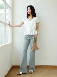 K-Vae Women's Light Wash Denim Flared Jeans With Sparkly Rhinestone Embellishments. Stylish Extra Long Bell Bottom Jeans For A Look.