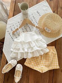 SHEIN Bộ 2 món cho bé gái, gồm áo hai dây xếp tầng và quần short kẻ caro dáng rộng, trang phục thường ngày dễ thương, thời trang cho đi chơi, chụp ảnh, công viên, cắm trại, mặc hàng ngày, dự tiệc, kỳ nghỉ. - trắng - Xem 2