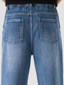 SHEIN Jeans casual e versatili per ragazzi adolescenti, capo di moda semplice e comodo, pantaloni in denim con gamba ampia e vestibilità comoda, lavaggio dell'acqua, effetto slavato e strappato, colore nero