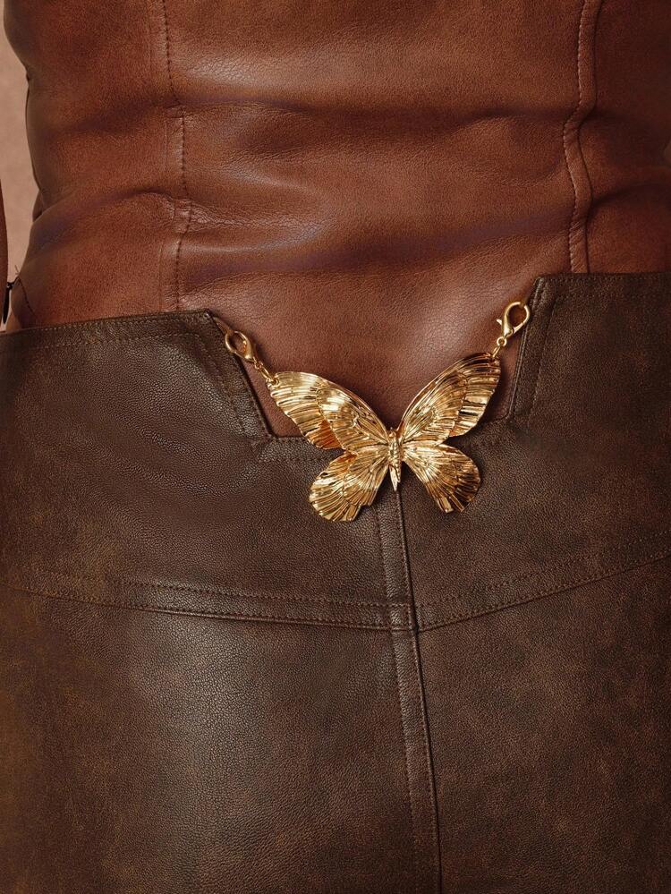 Damskie, wiosenne i letnie, krótkie spodenki z niskim stanem, PU, obcisłe, z kokardką i metalowymi ozdobnymi brązowymi wstawkami.