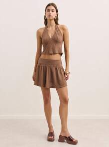 Nöista Acest set maro din două piese prezintă un top scurt cu decolteu adânc în V și o fustă mini asortată, cu un model evazat lejer. Materialul tricotat minimalist și silueta modernă și elegantă fac ca acest set să fie ideal pentru ținute de vară, inspirate de Y2K sau ca o ținută elegantă pentru concerte country. - Maro - Vizualizare 7