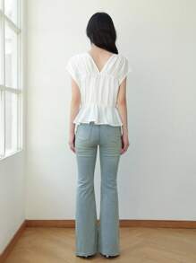 K-Vae Women's Light Wash Denim Flared Jeans With Sparkly Rhinestone Embellishments. Stylish Extra Long Bell Bottom Jeans For A Look.