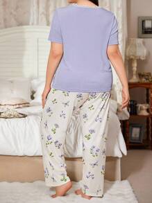 CottageSlumber CottageSlumber طقم بيجامات بمقاس كبير من قماش مضلع، مزين بطبعة زهرية على الياقة، توب بأكمام قصيرة وبنطال واسع
