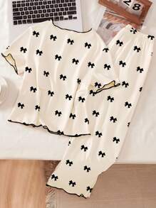 SHEIN Bộ đồ ngủ 2 món cho nữ, màu mơ in họa tiết nơ đen toàn bộ, thiết kế viền tương phản, áo tay ngắn và quần dài, bộ đồ ngủ thanh lịch, thời trang trở lại trường - Màu be - Xem 2